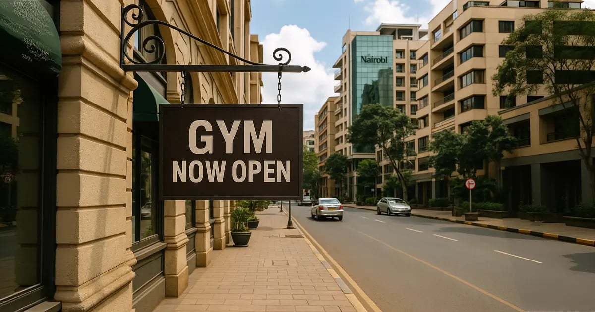 Gym now open sign on a street in Nairobi