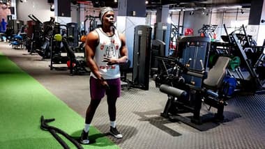 Rogers Adinda standing in an empty gym in 2023