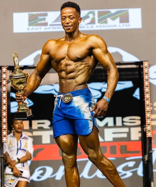 Joe Ripper holding trophy at MR 001 Championship