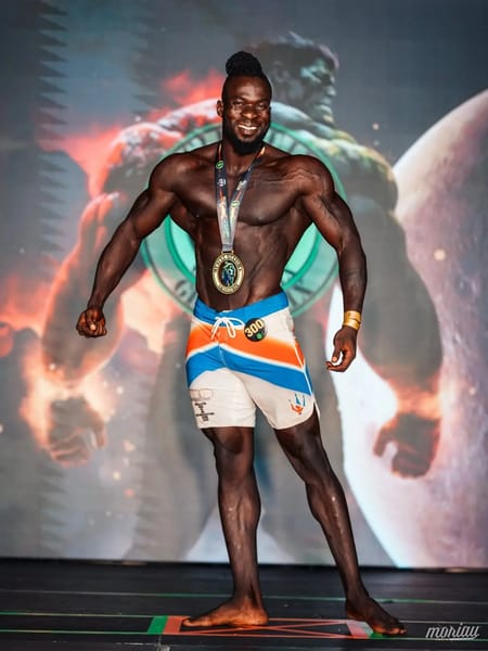 Joseph Wesonga on stage at the NPC African Championships 2025 in South Africa